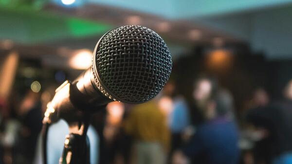 Picture of Microphone on stage facing audience